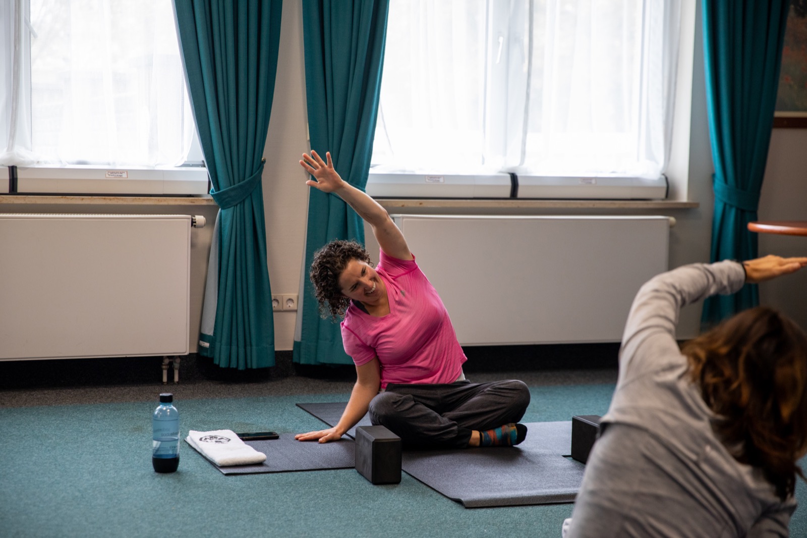 People stretching during a wellness class